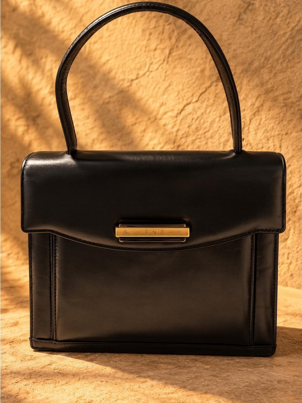 Givenchy Black Leather Top-Handle Satchel with Gold Plaque